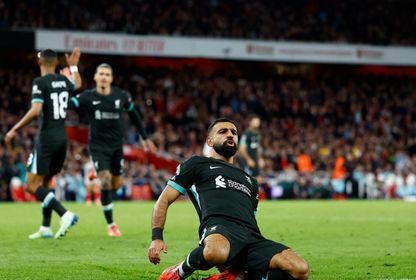 محمد صلاح لاعب ليفربول يحتفل بالتسجيل أمام أرسنال في الدوري الإنجليزي - 27 أكتوبر 2024 - Reuters